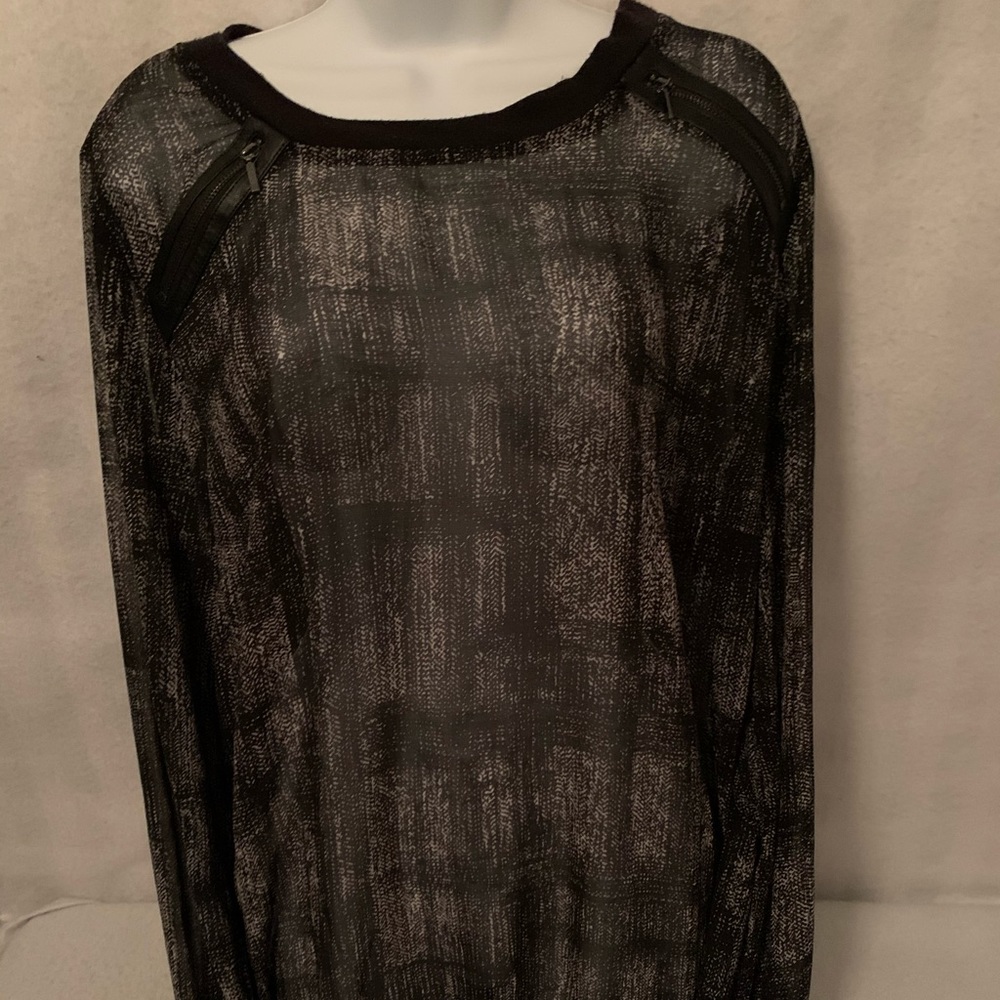 A black see through shirt